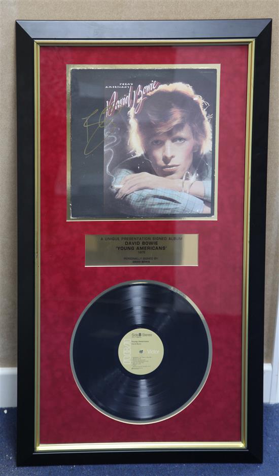 David Bowie. A signed presentation copy of the album Young Americans 1975, overall 37.5 x 21.5in.
